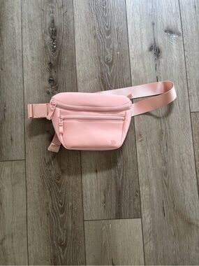 All in Motion Premium Belt Bag in Blush Pink.